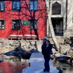 Toms wife and bonus daughter on a foot crossing over the river Mesna in Lillehammer, Norway