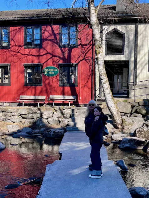 Toms wife and bonus daughter on a foot crossing over the river Mesna in Lillehammer, Norway